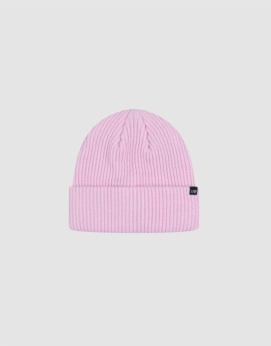 The LIVE FAST DIE YOUNG Double Rib Knit Beanie features a light pink ribbed polyamide design, folded cuff, and a small black side flag-label, shown against a plain white background.