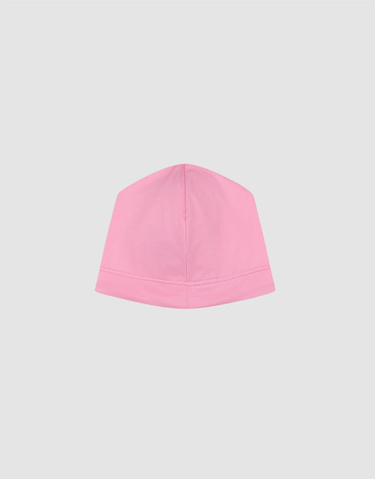 The Live Fast Performance Beanie by LIVE FAST DIE YOUNG features a plain pink design with soft fleece lining and minimal stitching, shown from the front on a light gray background without extra embellishments.