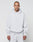 A person with a shaved head models the LIVE FAST DIE YOUNG Basic Blank Hooded and matching sweatpants in light gray, featuring an oversize fit and soft Baumwolle fabric, standing forward against a plain background.