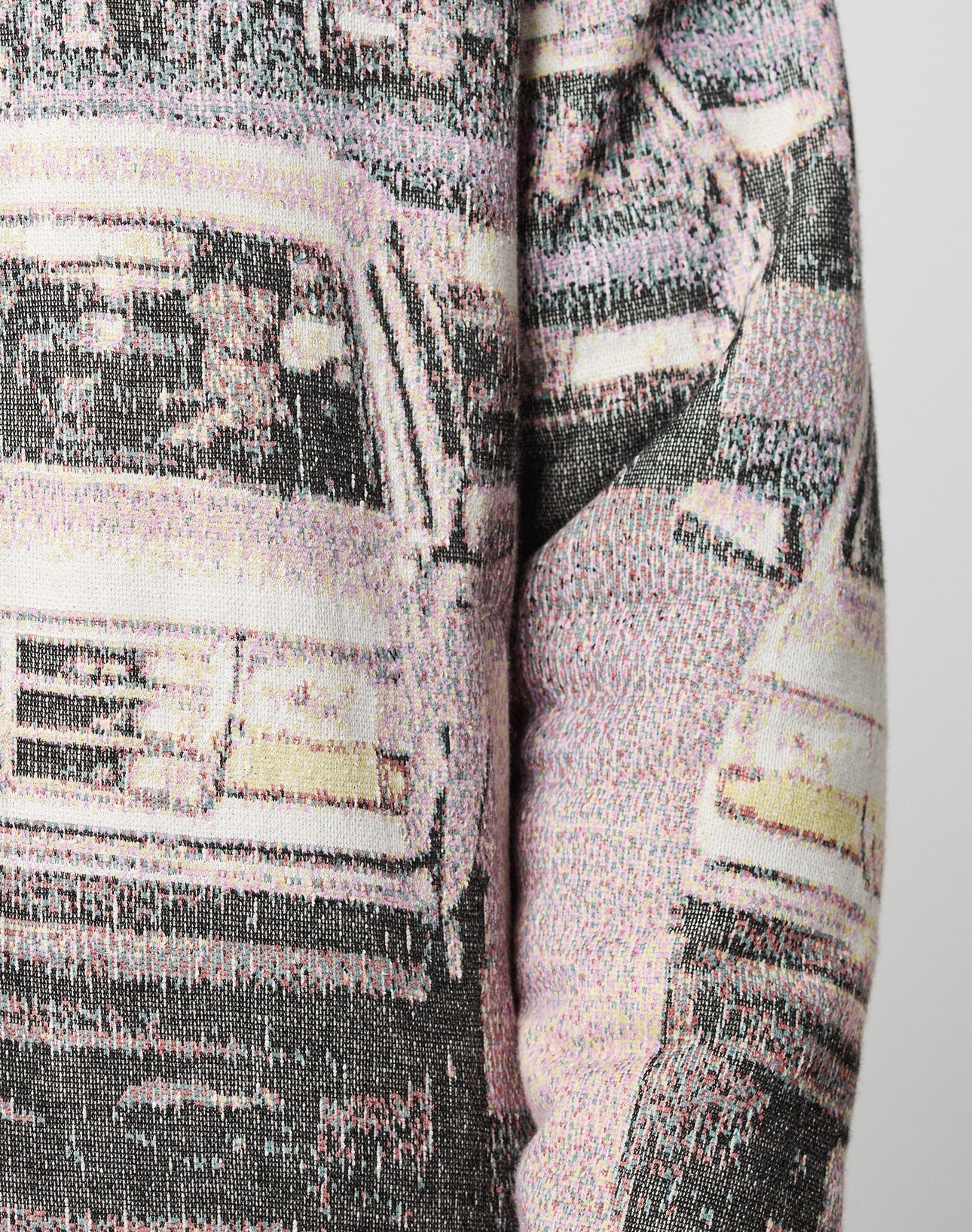 Close-up of the LFDY Chase Jacket by LIVE FAST DIE YOUNG, showing a printed car traffic pattern with detailed headlights and drivers, creating a textured, abstract effect in an oversized fit.