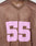 A person wears the LFDY Mesh Jersey by LIVE FAST DIE YOUNG: a brown, oversized mesh top with a V-neck, large pink 55 on the front, and LFDY lettering near the collar.