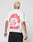 A person with short, bleached blonde hair wears the LFDY Hinterhof Tee by LIVE FAST DIE YOUNG, featuring large red LIVE FAST WINTERHOF text and two wrestlers on the back. The 100% cotton white shirt is shown from behind.