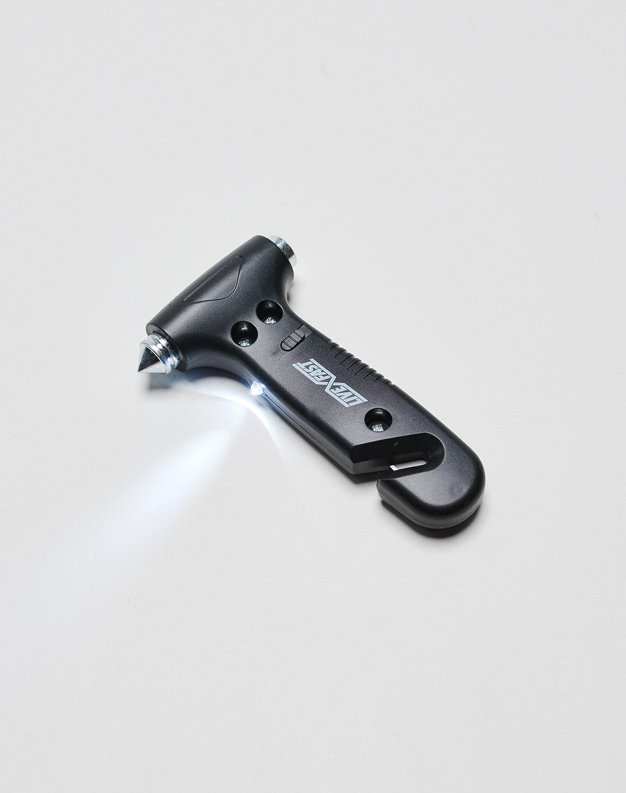 The LIVE FAST DIE YOUNG LFDY Emergency Hammer, One Size, in black, features a pointed metal tip, seatbelt cutter, and two small LED lights. Logo Print and LF2503-16986 details available upon request. It sits on a plain white surface.