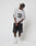 A person in a black cap, LIVE FAST DIE YOUNG LFDY Mesh Jersey (gray, number 13, v-neck), black flame shorts, white socks, and sneakers stands against a white background looking down.