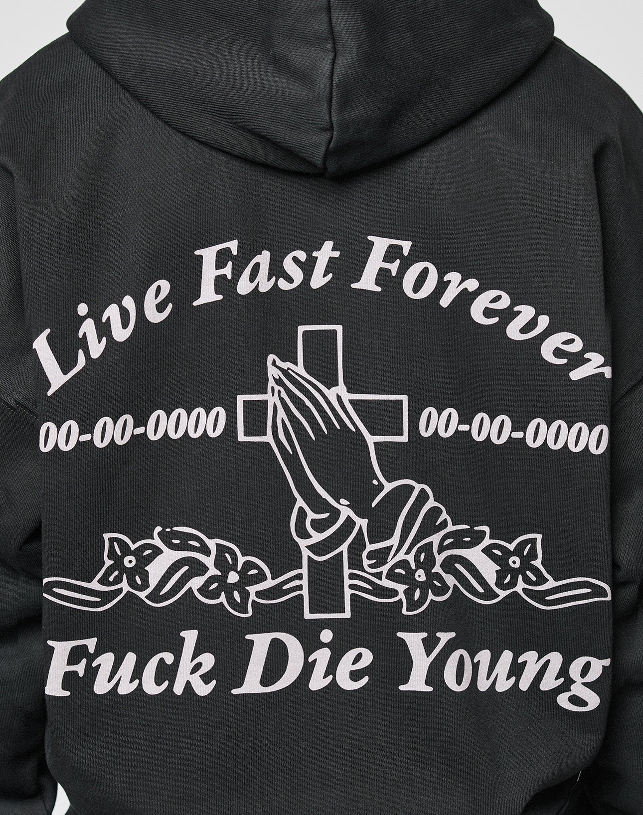The LFDY Praying Hooded Zip by LIVE FAST DIE YOUNG is an oversize hoodie with a distressed effect, featuring Live Fast Forever and Fuck Die Young text, praying hands with a cross, floral details, and 00-00-0000 dates.