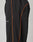 The LIVE FAST DIE YOUNG Live Fast Trackpants are black with an elastic waistband and drawstring, thin orange side piping, a reflective logo print on the thigh, and a wide fit, photographed against a plain background.