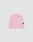 The LIVE FAST DIE YOUNG Basic Beanie in light pink polyacryl features a folded brim and a small black flag label on the front, shown against a plain light gray background.