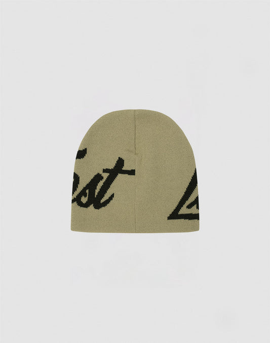 The LFDY Jacquard Beanie by LIVE FAST DIE YOUNG is a khaki Polyacryl knit hat featuring partial black cursive "Logo Strick" lettering on a plain white background.