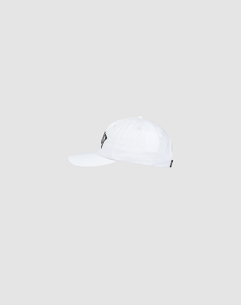 The LIVE FAST DIE YOUNG Live Fast Unstructured Cap is a white cotton baseball cap with a curved brim, small black logo on the front, and snap closure, shown against a plain light gray background.