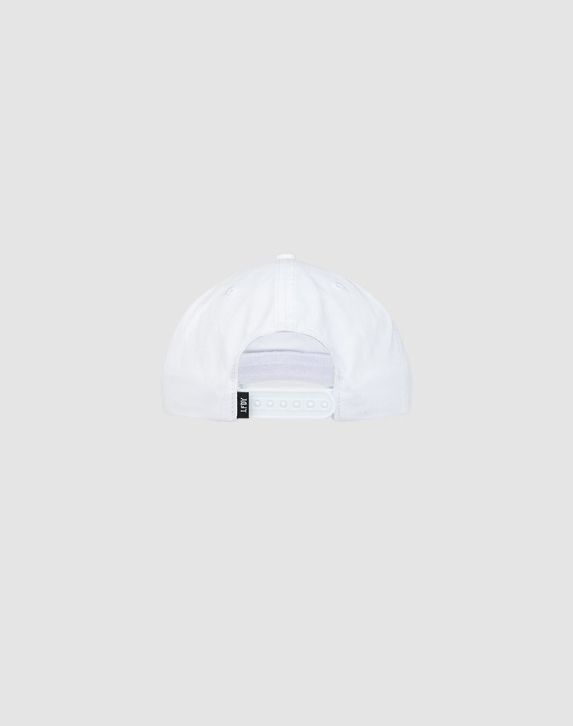 The Live Fast Unstructured Cap by LIVE FAST DIE YOUNG is a white cotton baseball cap, shown from the back with an adjustable snap closure and a small black tag on the left side. The background is plain light gray.