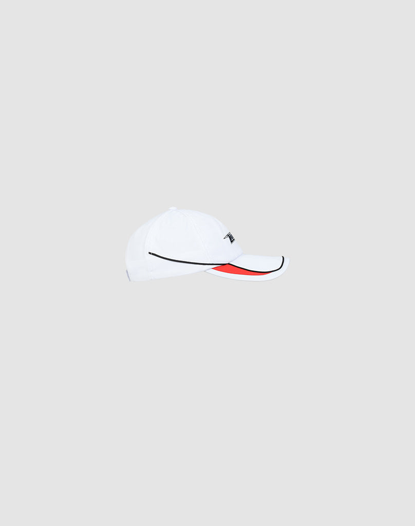 The LIVE FAST DIE YOUNG Live Fast 3000 Cap is a white baseball cap with a black side stripe, stylish pipings, red under-brim accent, and adjustable Klettverschluss, shown against a plain light gray background.