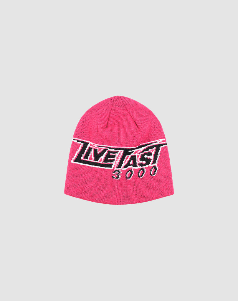 A bright pink Live Fast 3000 Beanie by LIVE FAST DIE YOUNG, featuring “NEWFAST 5000” in bold black and white letters on the front, style LF2503-16967, displayed on a plain light gray background. 