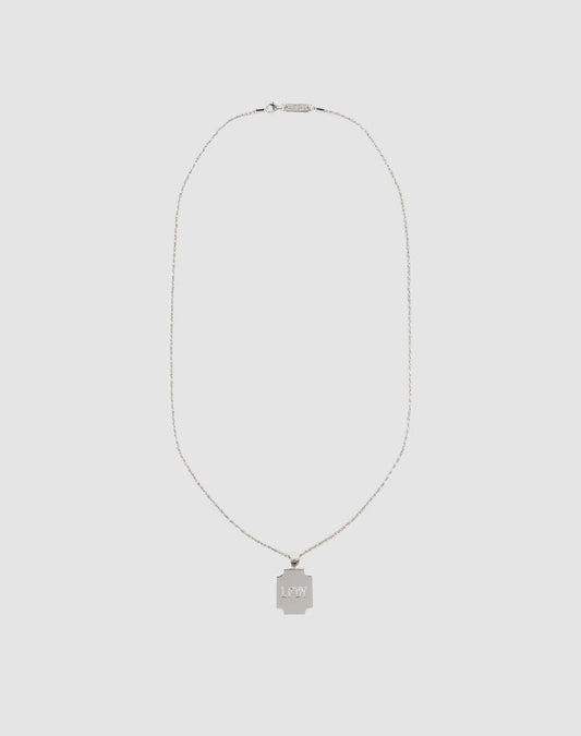 The LFDY Monaco Boys Plate Chain by LIVE FAST DIE YOUNG features a delicate sterling silver chain and a square pendant engraved with L*MY, showcased against a plain light gray background.