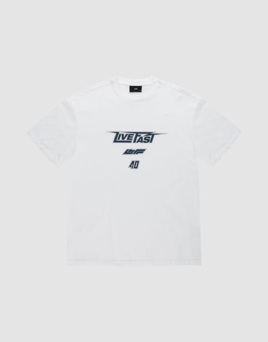 The LFDY Triple Racing Tee by LIVE FAST DIE YOUNG is a white shirt with black and gray multilogo front print—LIVE FAST in bold, AD below—crafted from 100% Baumwolle and shown against a light gray background.