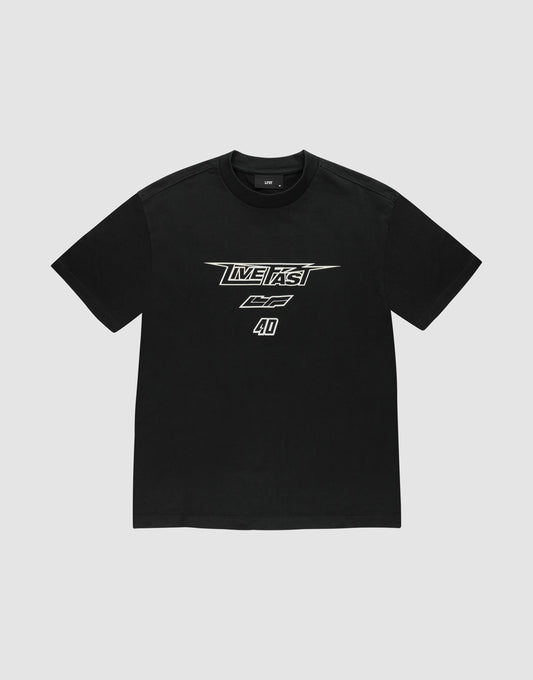 The LFDY Triple Racing Tee by LIVE FAST DIE YOUNG is a black oversized short-sleeve t-shirt with bold white multilogo frontprint—LIVE FAST, CF, and 4D—in a racing-inspired font. Made from 100% Baumwolle and shown on a light grey background. | plain