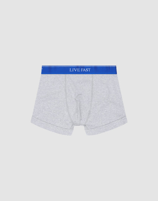 LIVE FAST DIE YOUNG Live Fast Trunks (2 Pack): Light grey mens Regular Fit boxer briefs in soft cotton, blue elastic waistband with LIVE FAST in white, shown on a plain white background.