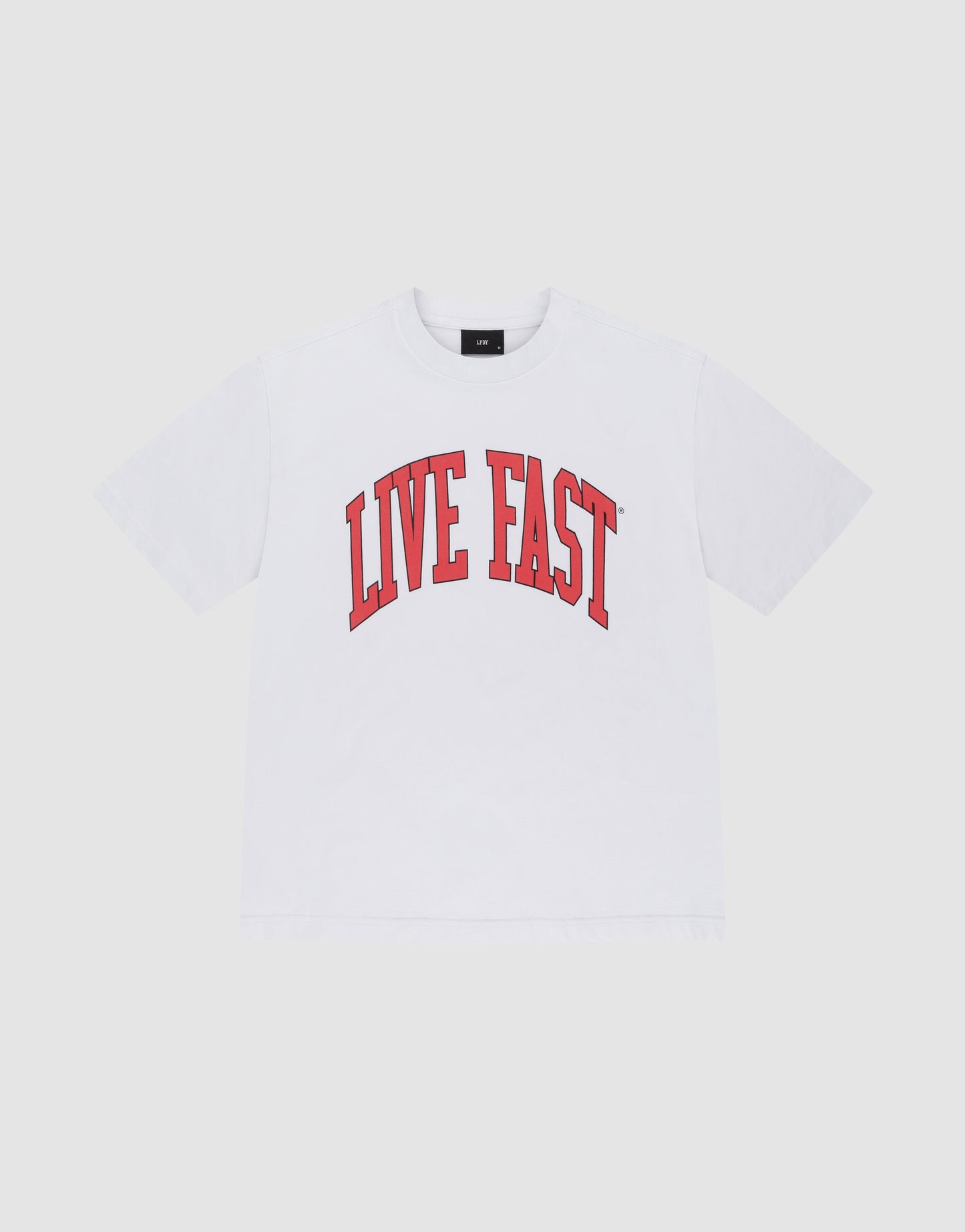 The Live Fast College Tee by LIVE FAST DIE YOUNG is a white, short-sleeve T-shirt featuring bold arched red "LIVE FAST" text on the chest. Made from 100% Baumwolle with an oversized fit for added comfort.