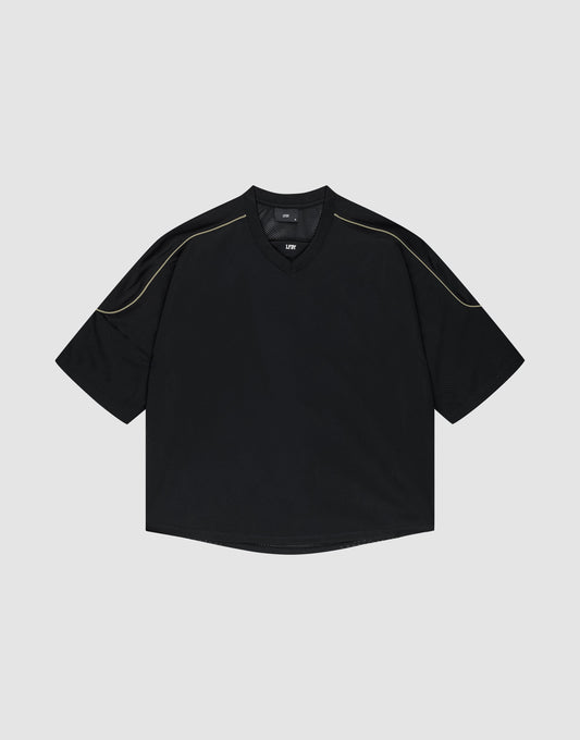 The LIVE FAST DIE YOUNG Basic Mesh Jersey is a black, short-sleeve, oversize-fit shirt with subtle contrast shoulder stitching, shown against a plain light gray background. | plain