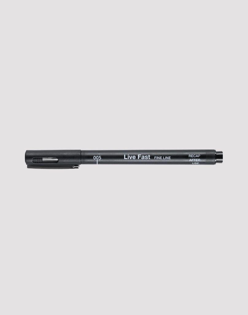 A black LFDY Fineliner Set pen by LIVE FAST DIE YOUNG is placed horizontally on a plain light gray background, showing white text with the product name, model number, and a reminder to recap after use.