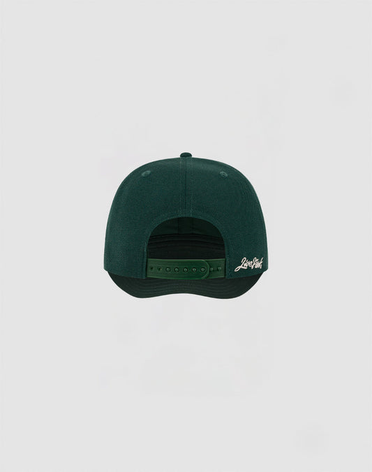A dark green LIVE FAST DIE YOUNG LF Snapback, shown from the back with an adjustable snapback strap and white script text on the lower right. The Multi-Logo Stick LF2308-14417 adds distinction. Set against a plain light gray background.