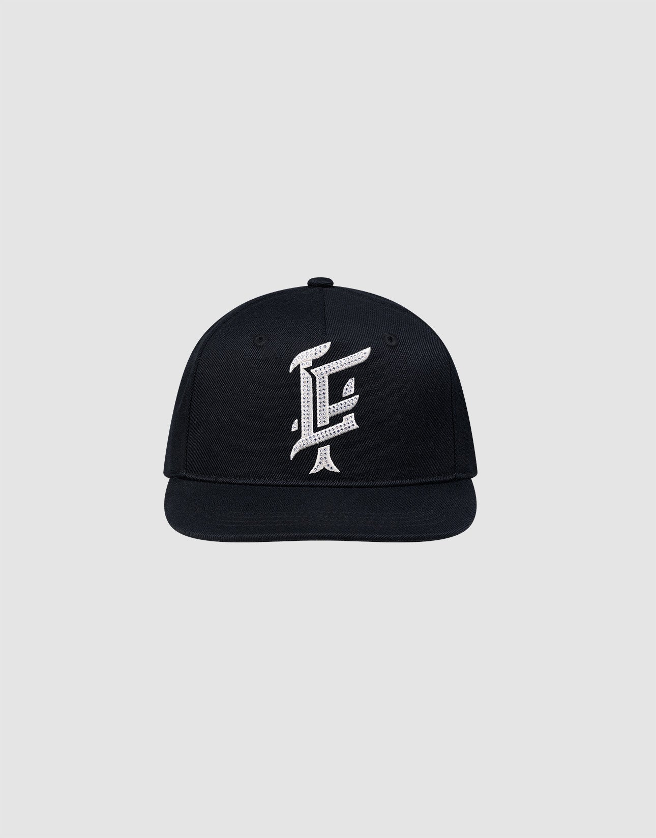 The LF Rhinestone Cap by LIVE FAST DIE YOUNG features a black cotton design with a bold white embroidered letter F on the front, showcased against a plain light gray background.| plain 