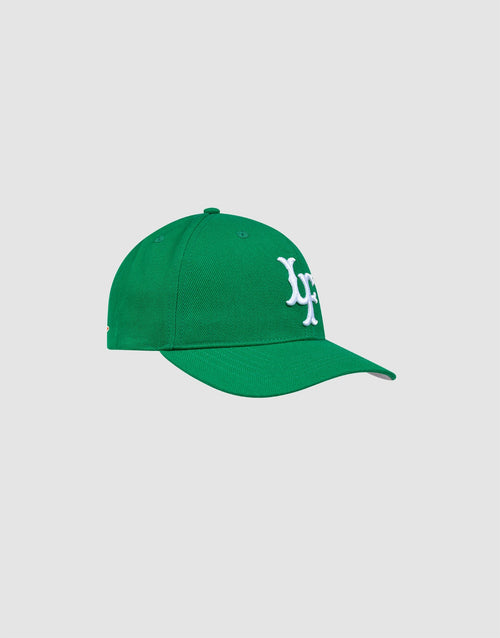 The LFDY Snapback by LIVE FAST DIE YOUNG is a green cap with a curved brim and green underside, white embroidered LF logo on the front, and a snap closure, displayed on a plain light gray background.