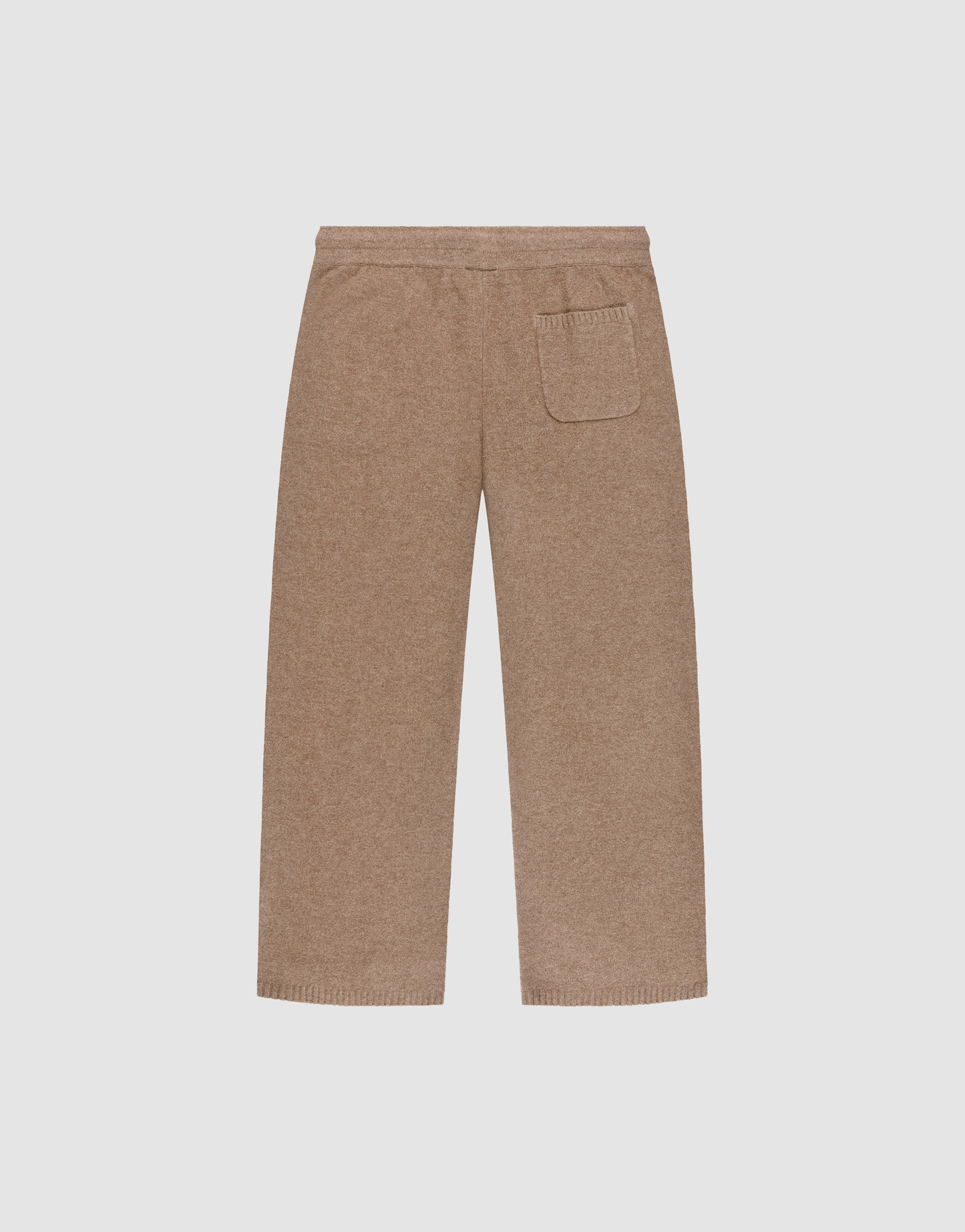 The Live Fast Boucle Pants by LIVE FAST DIE YOUNG are beige, wide-leg knit pants with an elastic waistband, straight leg, and a single back patch pocket, shown flat on a white background.