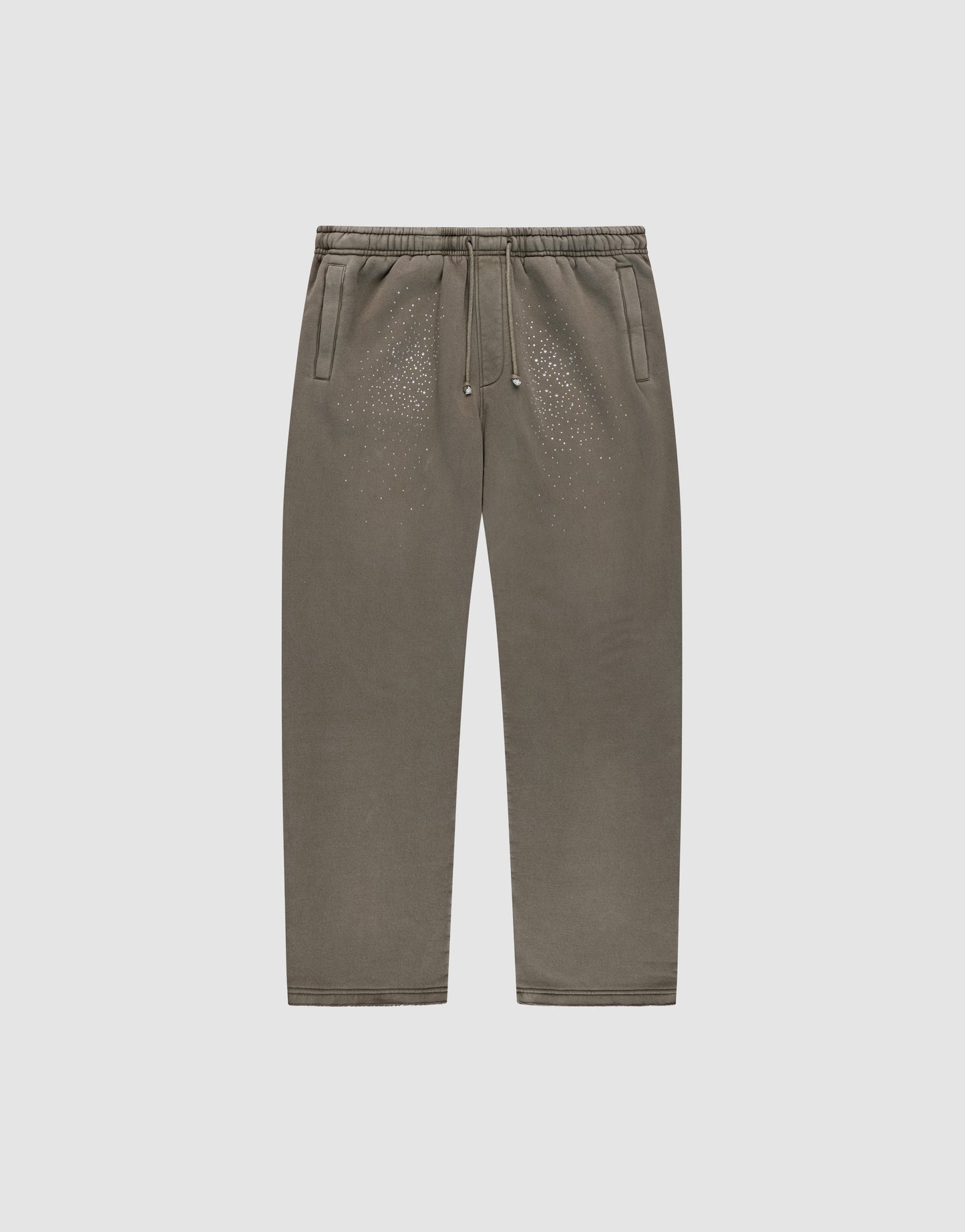 The Live Fast Rhinestone Jogger by LIVE FAST DIE YOUNG features an olive green oversize fit, elastic waistband with drawstring, side pockets, and subtle distressed spots on the upper front legs, shown on a plain light gray background.