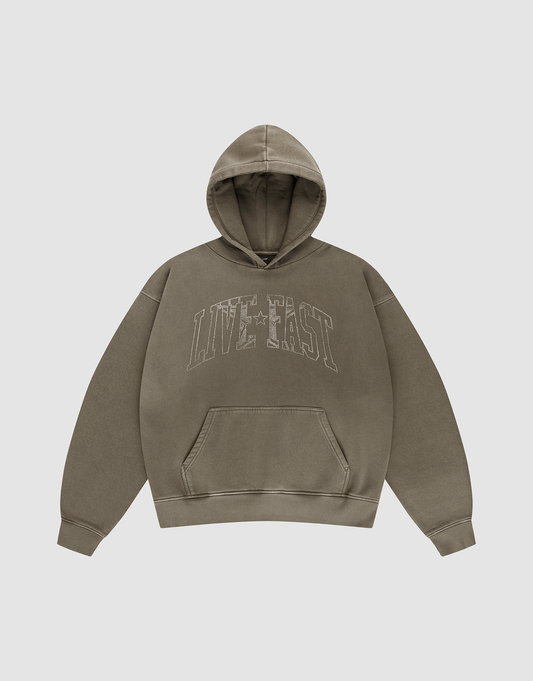 The LIVE FAST DIE YOUNG Live Fast Rhinestone Hooded sweatshirt is olive green, oversized, with a front pocket and "LIVE FAST" in bold distressed white across the chest for a cool vintage look. | plain