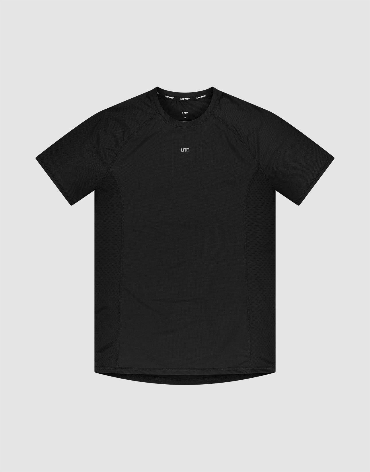 The LFDY Performance Slim Tee by LIVE FAST DIE YOUNG is a black slim-fit, short-sleeve athletic t-shirt with a crew neck and a small white reflective logo print at the center chest, shown against a light gray background.