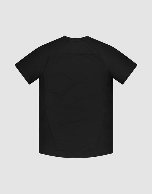 The LFDY Performance Slim Tee by LIVE FAST DIE YOUNG is a black, slim fit short-sleeve shirt with a reflective logo print on the back, displayed against a light gray background.