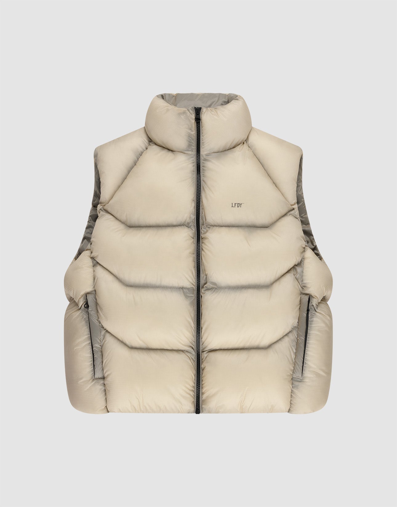 The Live Fast Puffer Vest by LIVE FAST DIE YOUNG features a beige color, high collar, black front zipper, two zippered side pockets, and an oversize fit, shown against a plain light gray background.