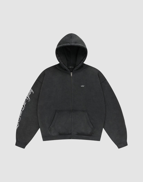 The LFDY Run Club Hooded Zip by LIVE FAST DIE YOUNG is a black oversize-fit hoodie with a front pocket, hood, small white LFTS chest text, and white cursive writing on the right sleeve, made from soft Baumwolle Polyester. Displayed on light gray.