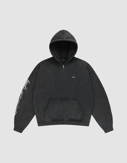 The LFDY Run Club Hooded Zip by LIVE FAST DIE YOUNG is a black oversize-fit hoodie with a front pocket, hood, small white LFTS chest text, and white cursive writing on the right sleeve, made from soft Baumwolle Polyester. Displayed on light gray.