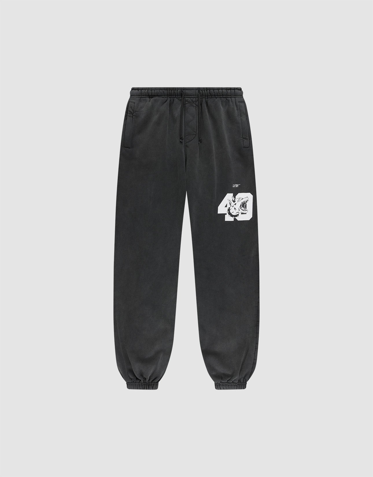 The LFDY 40 Wide Cuff Jogger by LIVE FAST DIE YOUNG features an oversized fit, elastic cuffs and waistband, white “40” graphic with small text near the left pocket, zip side pockets, and is made from cotton. Shown on a plain light gray background.
