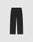 LFDY Performance Pants by LIVE FAST DIE YOUNG, featuring a black straight-leg design with an elastic waistband, side pockets, and a small white LFDY logo on the left thigh, displayed on a plain light gray background.