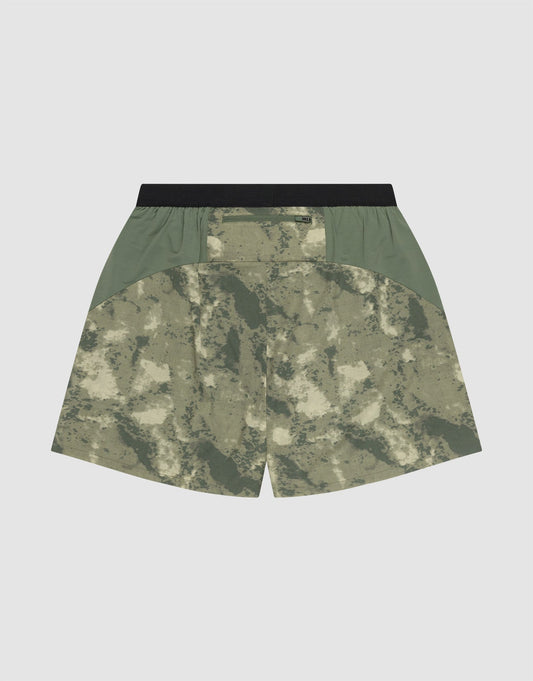 Back view of LFDY Performance Running Shorts by LIVE FAST DIE YOUNG, featuring green and beige digital camo, olive side panels, black elastic waistband, and a rear pocket with an integrated Handytasche.