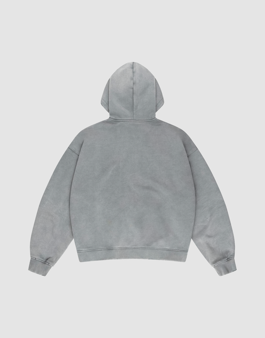 The LIVE FAST DIE YOUNG Basic Hooded Zip, an oversized light gray hoodie, is displayed on a flat white background from the back, with the hood up and sleeves slightly spread.
