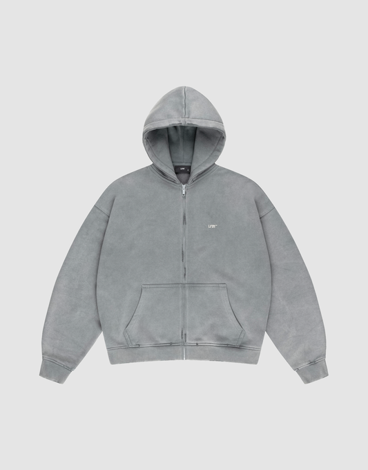 The LIVE FAST DIE YOUNG Basic Hooded Zip is a plain, light gray zip-up hoodie with a hood, front pockets, and a small white LIFT logo on the left chest, shown on a white background. | plain