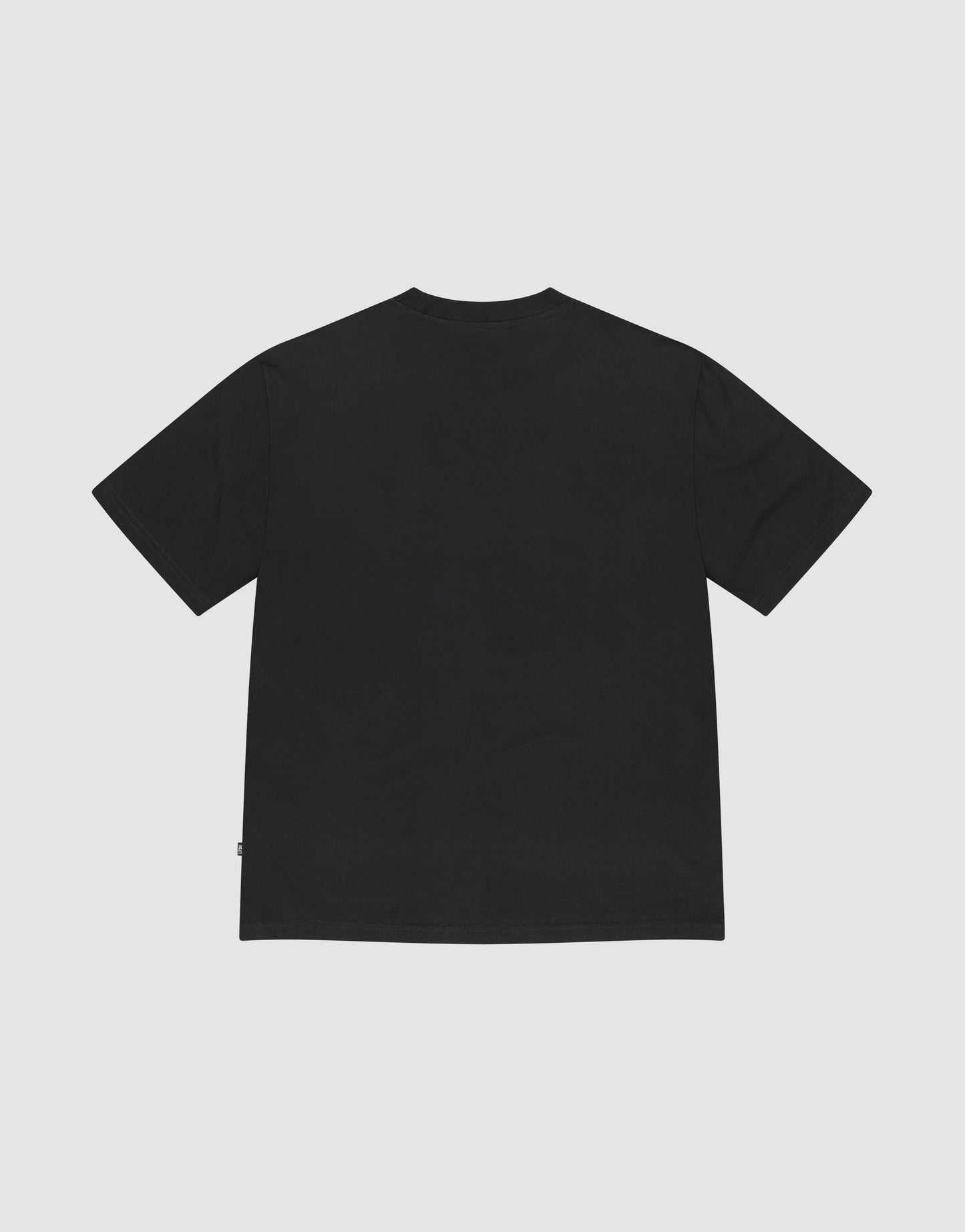 The Basic Chest Tee by LIVE FAST DIE YOUNG is a plain black short-sleeve T-shirt made from 100% Baumwolle, laid flat on a white background to show the back with a simple crew neck and no visible designs or logos.