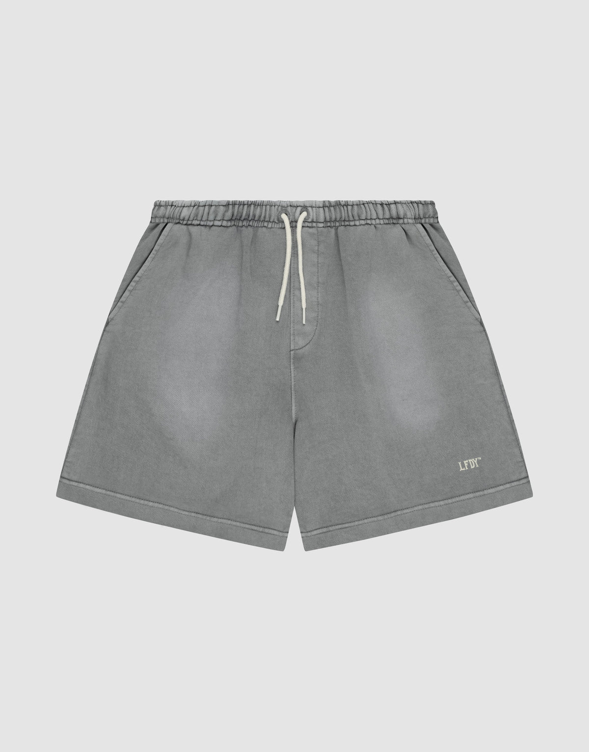 The LIVE FAST DIE YOUNG Basic Sweat Shorts feature a faded gray look, elastic waistband, side pockets, and a small logo print on the left leg, shown against a plain light background. | plain