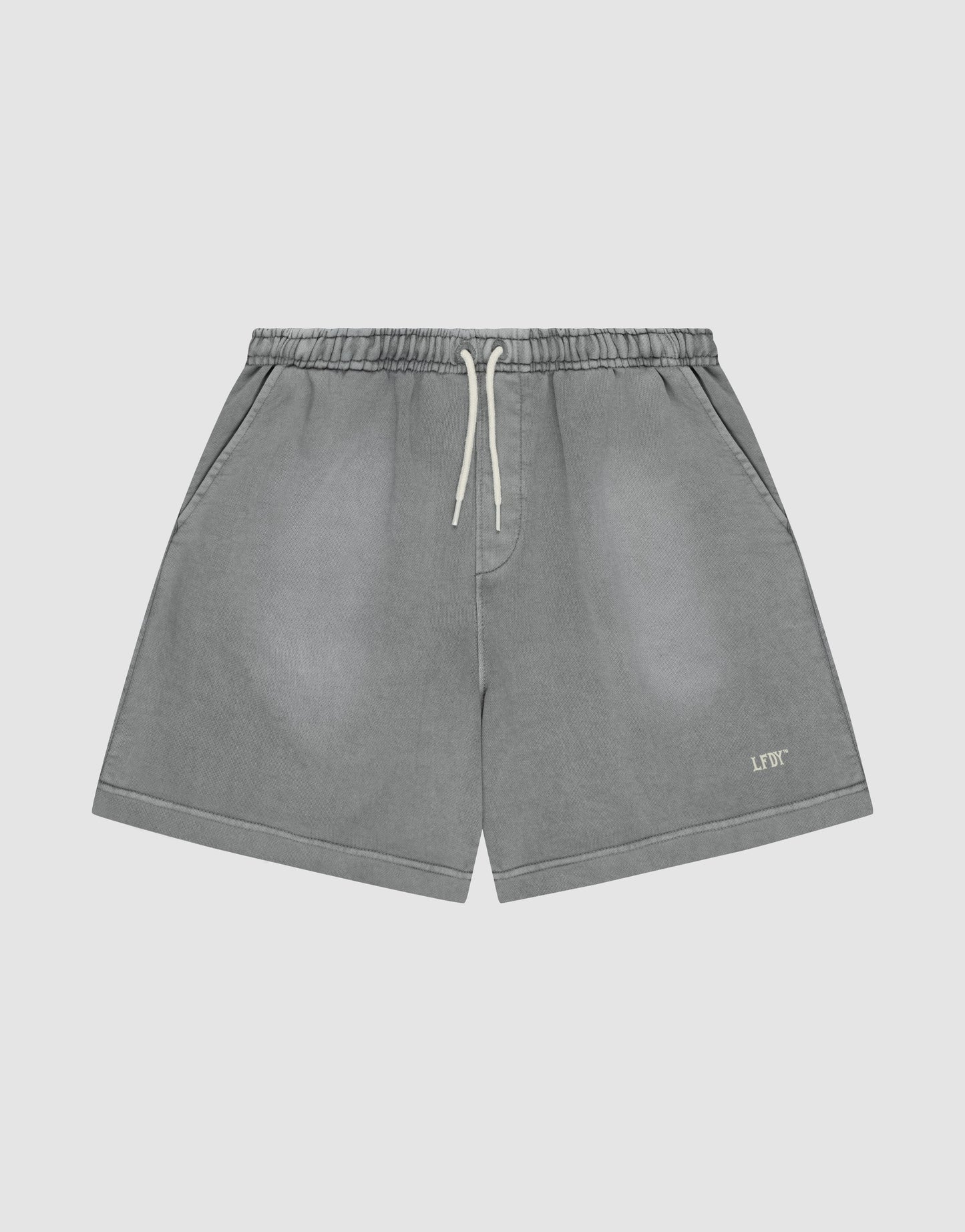The LIVE FAST DIE YOUNG Basic Sweat Shorts feature a faded gray look, elastic waistband, side pockets, and a small logo print on the left leg, shown against a plain light background. | plain