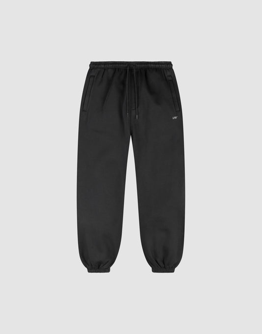 The LIVE FAST DIE YOUNG Basic Loose Jogger features a loose fit, elastic waistband with drawstring, side pockets, and elastic ankle cuffs, shown on a light gray background. | plain
