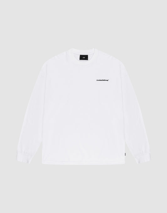 The Basic Longsleeve by LIVE FAST DIE YOUNG is an oversize white 100% Baumwolle T-shirt with a small black logo-print on the left chest, shown against a light gray background. | plain