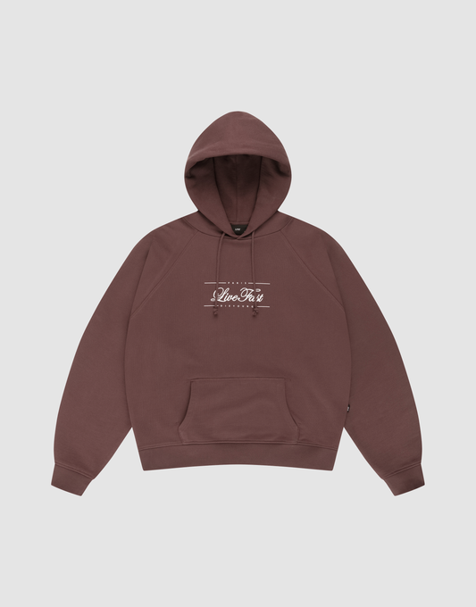 A brown LFDY Embroidery Hooded by LIVE FAST DIE YOUNG, crafted from soft 100% Baumwolle french terry, features a regular fit, front pocket, and white "Alive Tais Originals" text across the chest on a plain light gray background. | plain