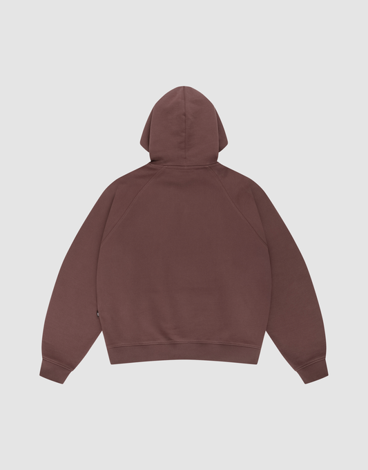 The LFDY Embroidery Hooded by LIVE FAST DIE YOUNG, made from soft french terry and 100% Baumwolle in a regular fit, is laid flat with the back facing up on a light gray background, showing its long sleeves and relaxed style.