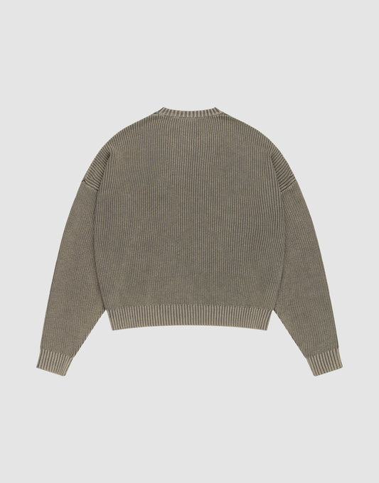 The LFDY Knit Sweater by LIVE FAST DIE YOUNG features a ribbed, taupe knit with long sleeves, dropped shoulders, and an oversized fit, shown from the back laid flat on a white background.