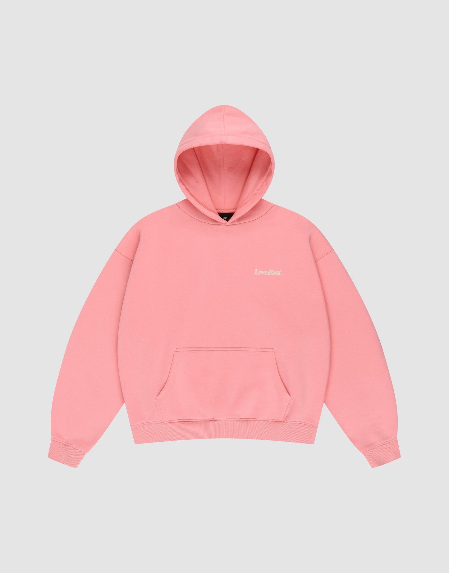 The Basic 360 Hooded by LIVE FAST DIE YOUNG is an oversized plain pink hoodie with a front pocket, topstitching, and small white "LIVELIFE" text on the left chest, shown on a light gray background.