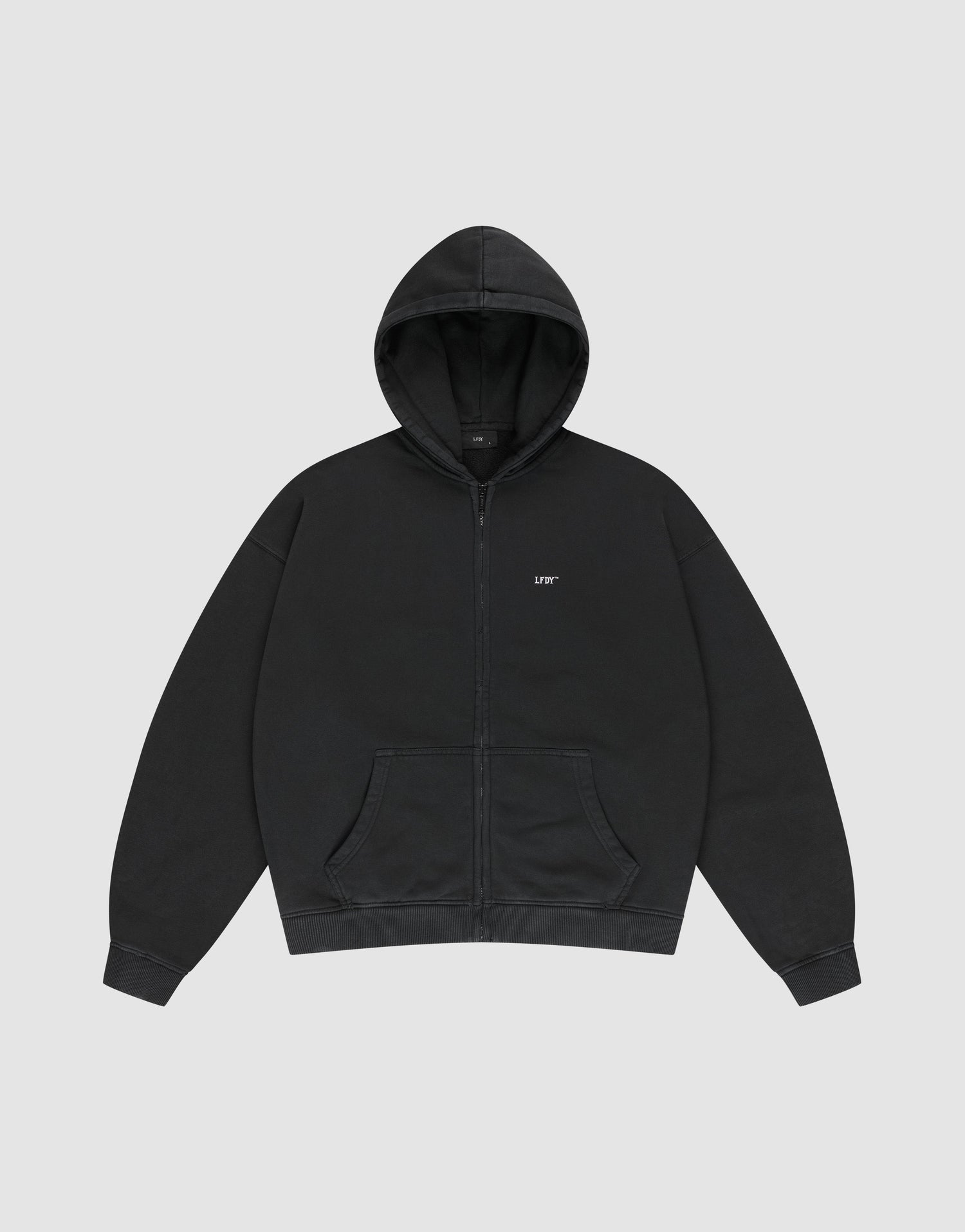 A black Basic Hooded Zip by LIVE FAST DIE YOUNG, oversize fit with front pocket and hood, features a small white LIFE logo on the left chest, shown against a light gray background. | plain