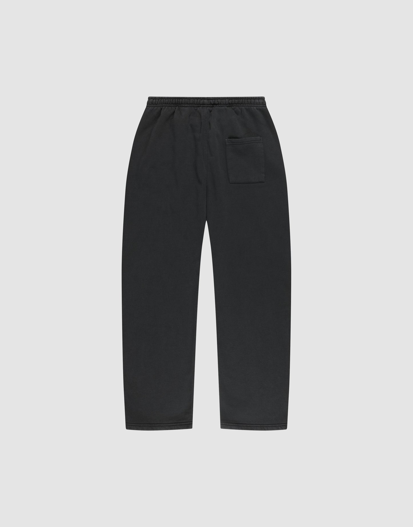 The LIVE FAST DIE YOUNG Basic Wide Jogger features a black wide fit, straight-leg design with an elastic waistband and a single patch pocket on the right, shown flat on a plain light gray background.